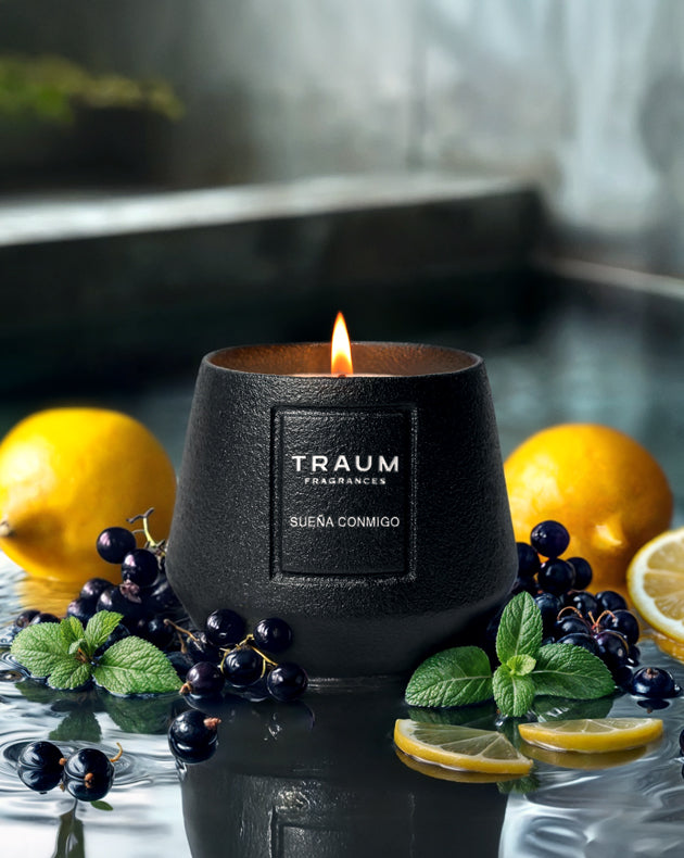 Suéña Conmigo: Experience the serenity of lemon peel, currant, and cassis, with a refreshing base of juniper and peppermint. This luxury, handcrafted candle offers a calming, lasting embrace.